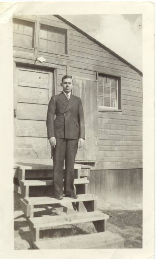 Edmund Gross in the C.C.C., Sydney, Montana in 1939. Edmund's first suit.