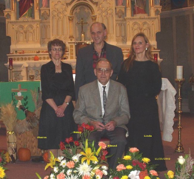 Sharon, Kenny, Linda and Dad, Ermina's Funeral, November 23, 2002 at Sts. Peter and Paul Catholic Church, Strasburg, ND