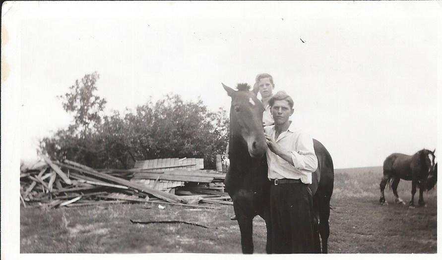 Michael Gross standing, son of Casper Gross on the Joe 
           Wald farm.  Sitting on horse is Bobby Kraft, son of Casimer and Ann (Gross) Kraft.