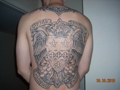 Greg Pacal with Gross Family Crest tatoo