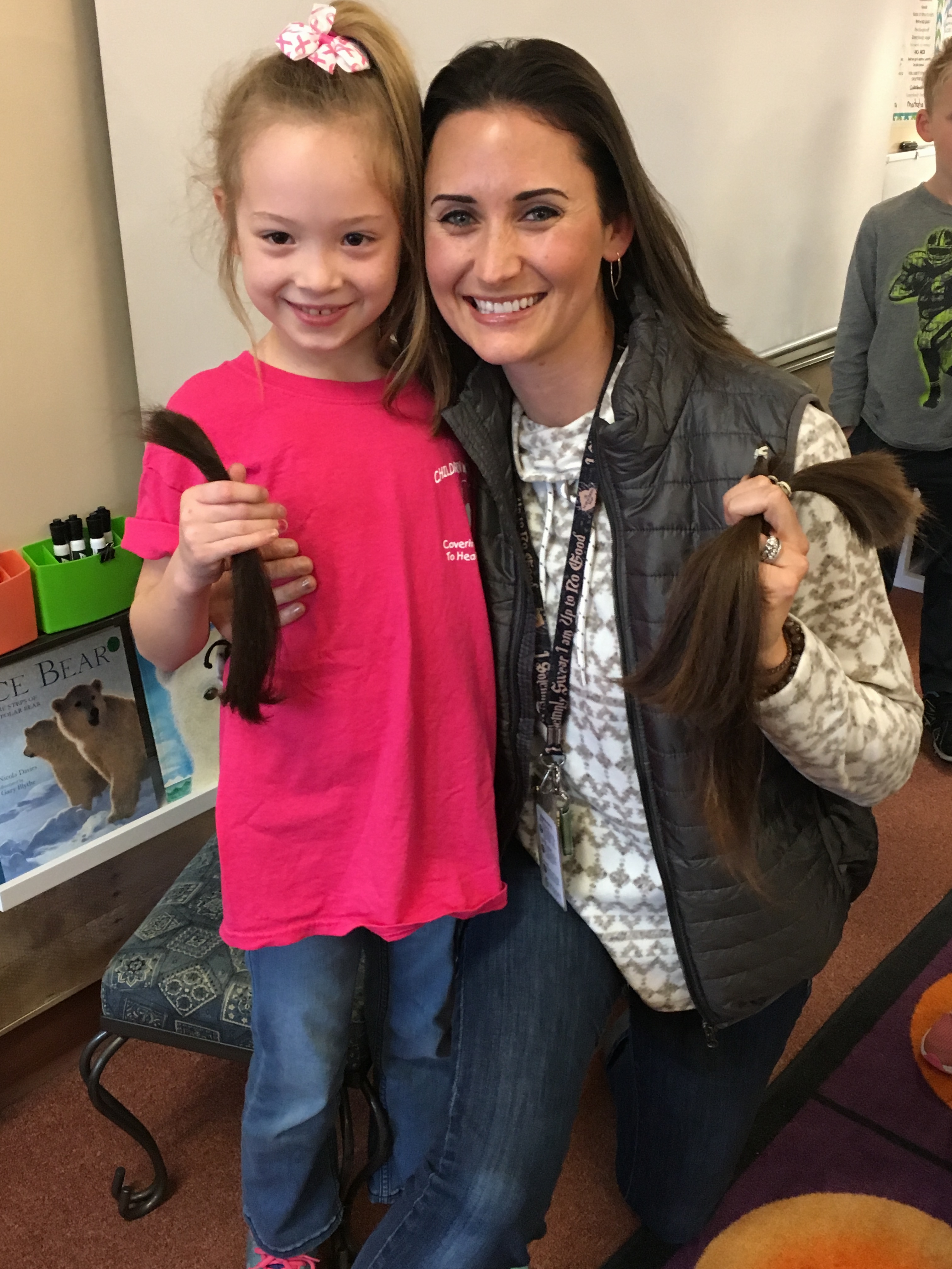 2018-2019 Ella cutting teachers hair-Ella selected by teacher  - donated to Hairloss.