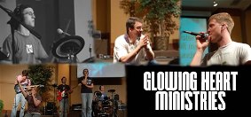 Justin singing with Glowing Hearts