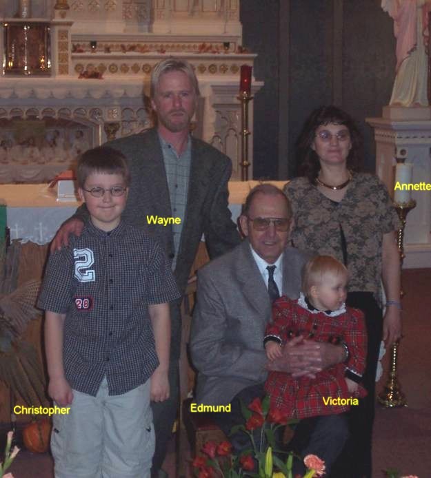 Annette (Gross) and Wayne Helm with Dad, Ermina's Funeral, November 23, 2002 at Sts. Peter and Paul Catholic Church, Strasburg, ND