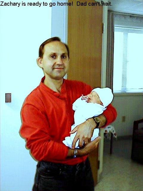 Dad holding Zachery