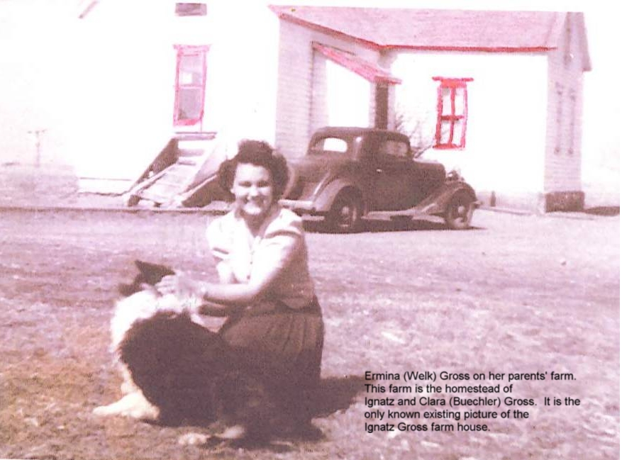 The farm house on the homestead of Ignatz and Clara (Buechler) Gross.  Ermina (Welk) Gross in approx 1944.