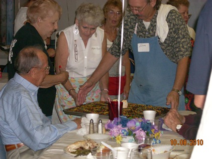 Presending the birthday cake at Matt's 90th birthday, Benson, AZ