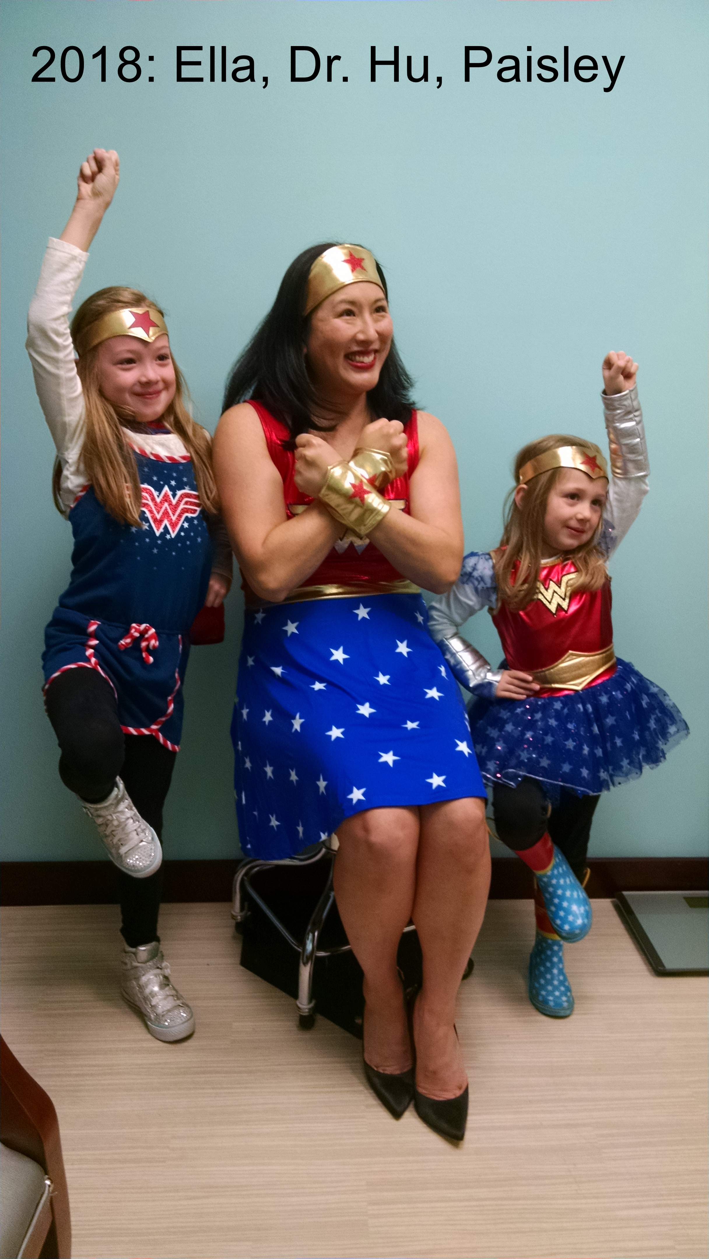 2018: Ella and Paisley with Dr. Hu, one of Emily's cancer doctors.