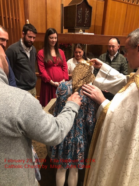 February 23, 2020:  Ella and Paisley Boullet baptized in the Roman Catholic faith by Msgr. John Cihak.