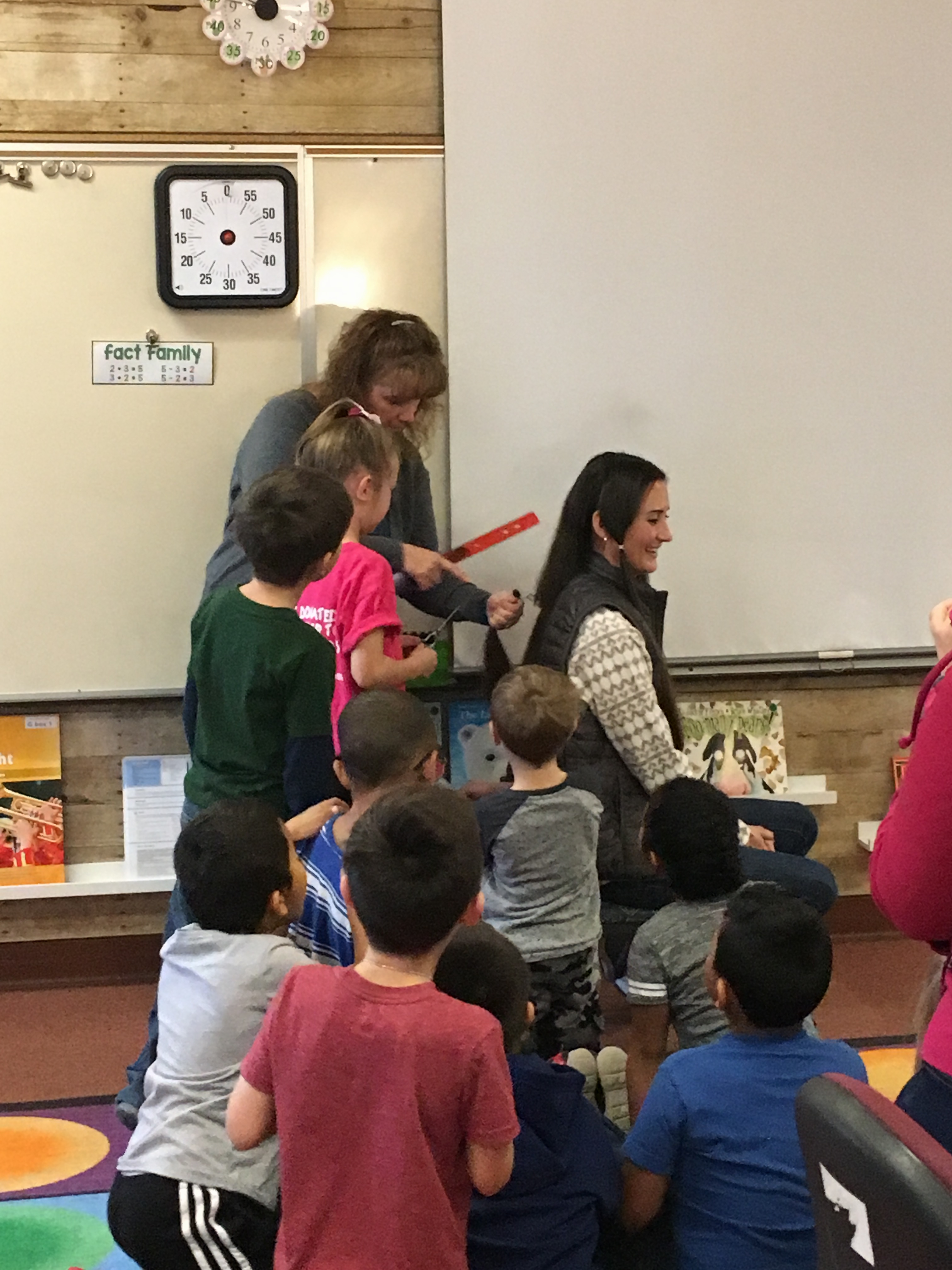 2018-2019 Ella cutting teachers hair-Ella selected by teacher  - donated to Hairloss.